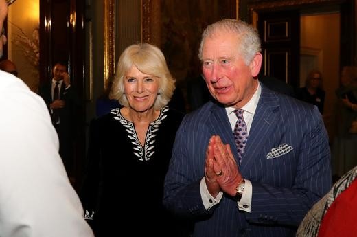FILE PHOTO: Britain's Prince Charles and Camilla, Duchess of Cornwall attend the Commonwealth Reception at Marlborough House