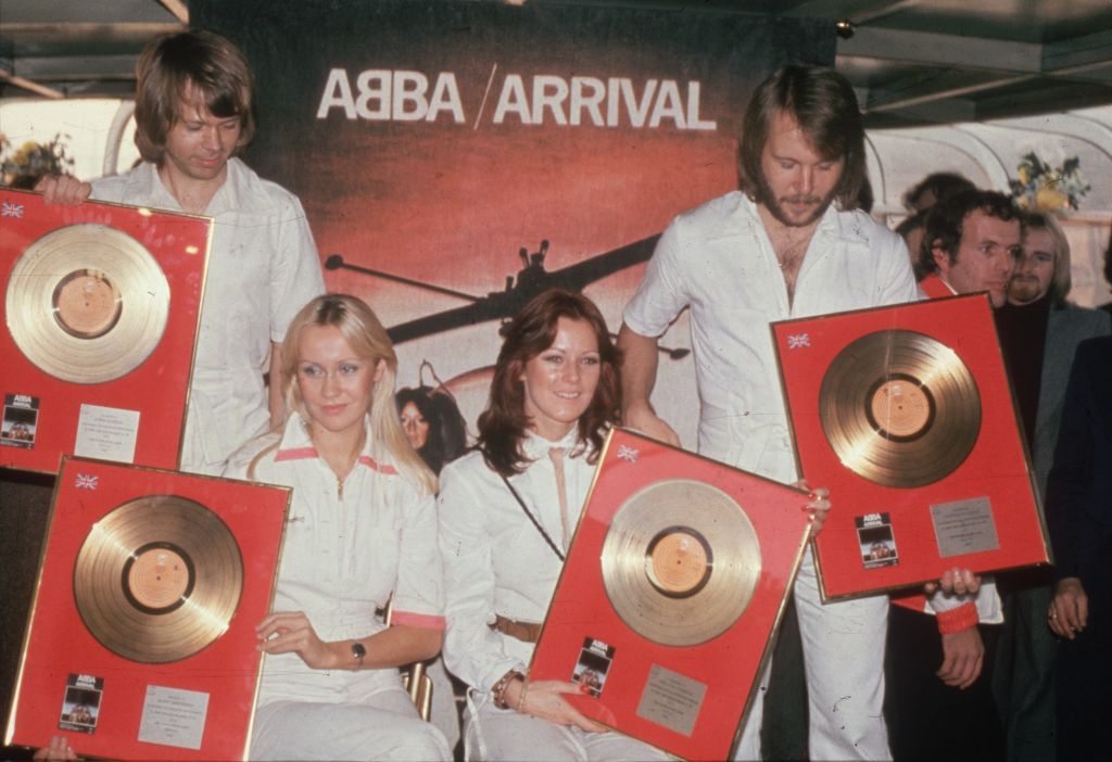 ABBA holding their golden discs. From l to r; Benny Andersson, Agnetha Faltskog, Anni-Frid Lyngstad and Bjorn Ulvaeus. 