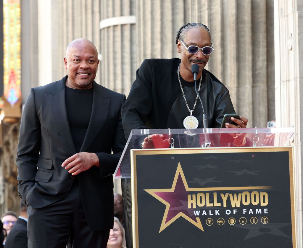 Dr. Dre and Snoop Dogg speak during the Hollywood Walk of Fame Star Ceremony for Dr. Dre on March 19, 2024 in Hollywood, Calif. 