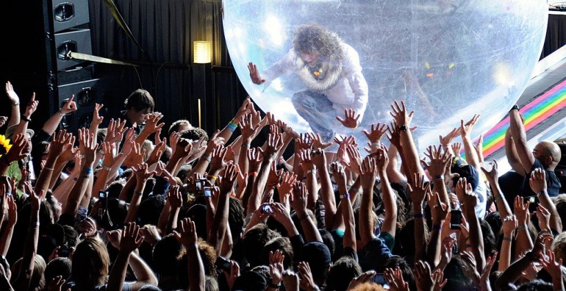 Wayne Coyne of the Flaming Lips rides his famous bubble in 2011.