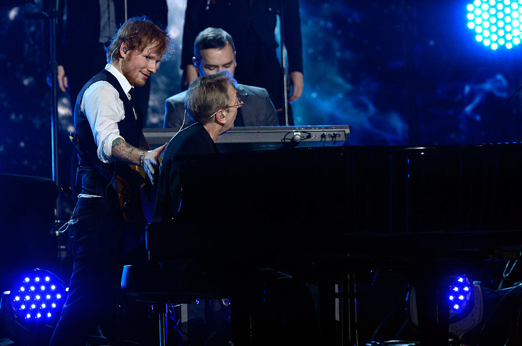 Ed Sheeran (L) and Richard Tandy perform "Mr. Blue Sky" onstage during The 57th Annual GRAMMY Awards at the at the STAPLES Center on February 8, 2015 in Los Angeles