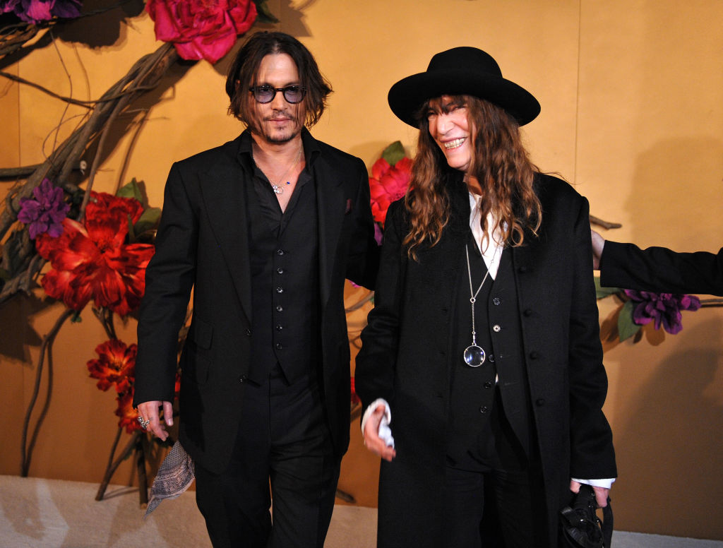 Johnny Depp and Patti Smith attends 'The Museum of Modern Art Film Benefit: A Tribute To Tim Burton' at The Museum of Modern Art on November 17, 2009 in New York City.