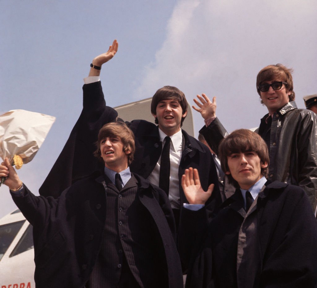 The Beatles, John Lennon, George Harrison, Paul McCartney and Ringo Starr, pictured on their arrival in London following a tour of Australia