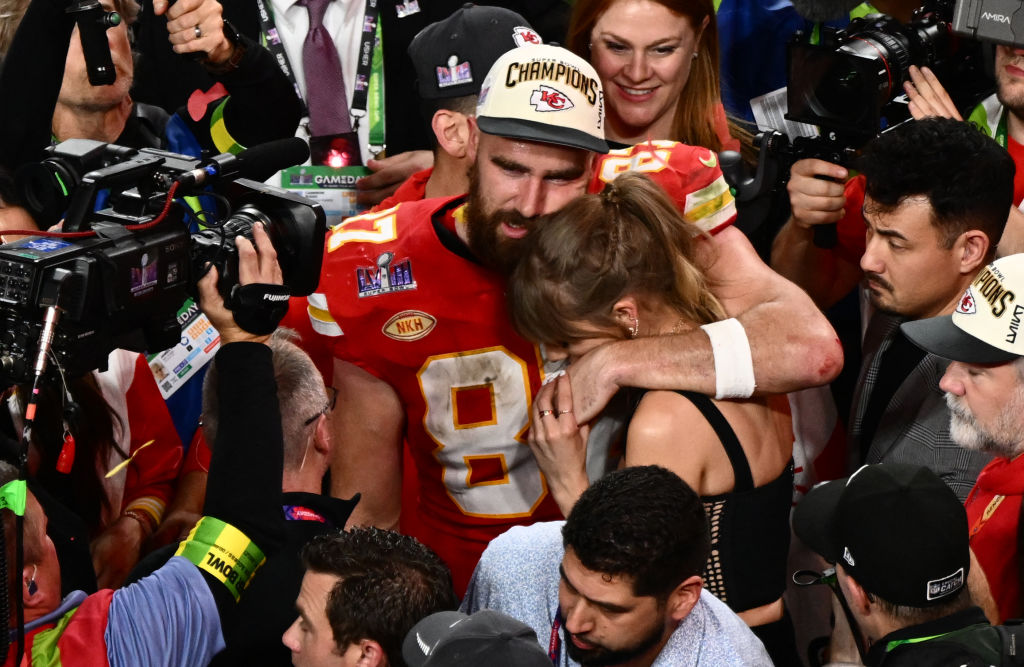 Taylor Swift and Kansas City Chiefs' Travis Kelce embrace after the Chiefs won Super Bowl LVIII