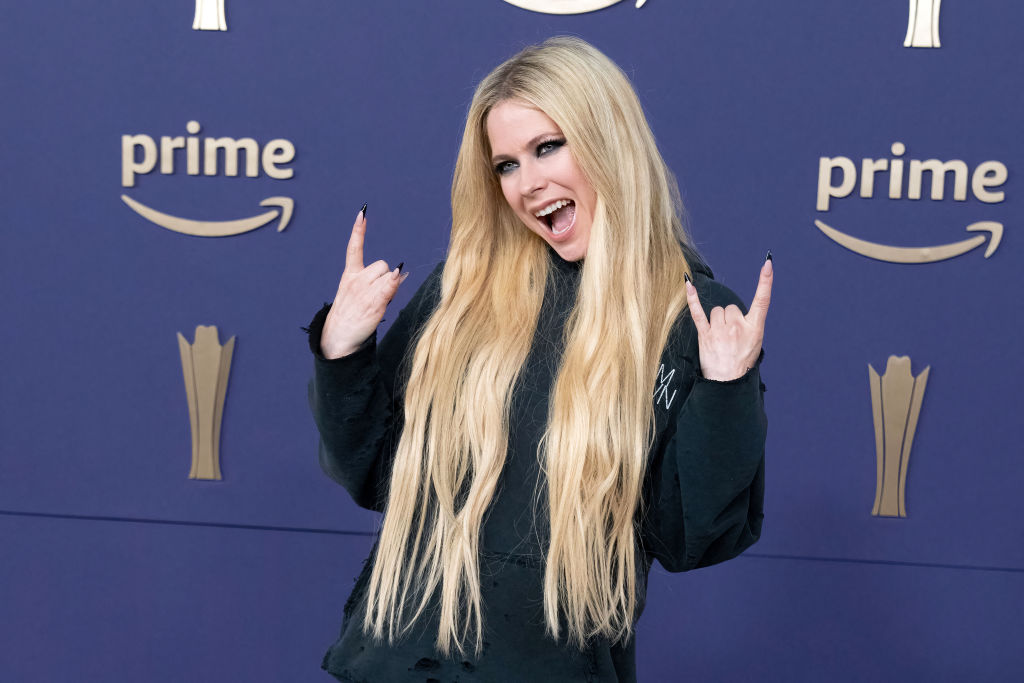 Tyga Who?  Avril Lavigne begins romance with new mystery guy, goes on PDA-filled lake date