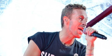 Chris Martin performs with U2 at World Aids Day