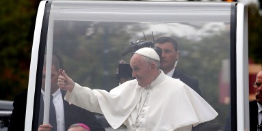  Pope Francis waves to the crowd from the Popemobile during a parade September 27, 2015 in Philadelphia, Pennsylvania. Pope Francis is in Philadelphia for the last leg of his six-day visit to the U.S. 