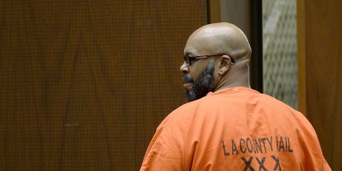 Marion 'Suge' Knight, who is charged with murder, attempted murder and hit-and-run for allegedly running down two men in Compton killing one of them, appears in court for his arraignment at Criminal Courts Building