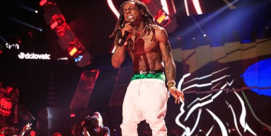 Rapper Lil' Wayne performs onstage at the 2015 iHeartRadio Music Festival at MGM Grand Garden Arena 