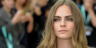 Cara Delevingne attends the Burberry Prorsum show during London Fashion Week Spring/Summer 2016/17 on September 21, 2015 in London, England.