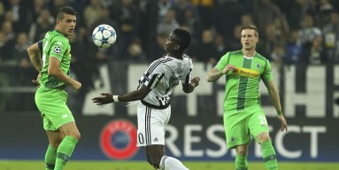 Paul Pogba (R) of Juventus competes for the ball with Granit Xhaka (L) of VfL Borussia Monchengladbach during the UEFA Champions League group stage match between Juventus and VfL Borussia Moenchengladbach at Juventus Arena on October 21, 2015 in Turin, It