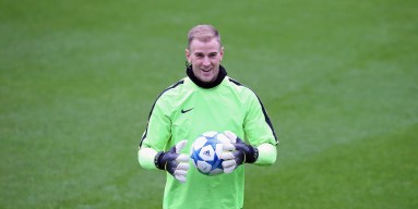 Joe Hart of Manchester City looks on during a training session at the City Football Academy on November 24, 2015 in Manchester, England. 