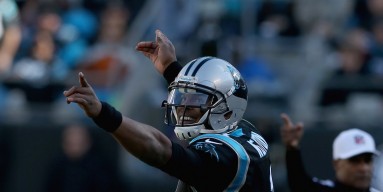 Cam Newton #1 of the Carolina Panthers signals a first down against the Washington Redskins in the 2nd quarter during their game at Bank of America Stadium on November 22, 2015 in Charlotte, North Carolina. 