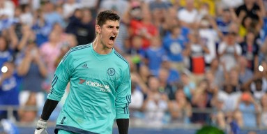 Goalkeeper Thibaut Courtois #13 of Chelsea reacts after making the game-winning save on a penalty kick against Paris Saint-Germain during their International Champions Cup match at Bank of America Stadium on July 25, 2015 in Charlotte, North Carolina. Che