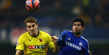 Tommy Hoban of Watford holds off Diego Costa of Chelsea during the FA Cup Third Round match between Chelsea and Watford at Stamford Bridge on January 4, 2015 in London, England.