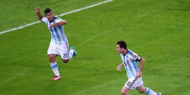 Lionel Messi of Argentina (R) reacts after scoring his team's second goal with Sergio Aguero during the 2014 FIFA World Cup Brazil Group F match between Argentina and Bosnia-Herzegovina at Maracana on June 15, 2014 in Rio de Janeiro, Brazil. 