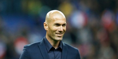 Former French international, Zinedine Zidane walks on the field prior to the International Friendly match between France and Brazil at the Stade de France on March 26, 2015 in Paris, France. 