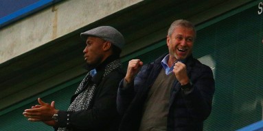 Didier Drogba (L) of Montreal Impact and Chelsea owner Roman Abramovich (R) celebrate Chelsea's second goal on the stand prior to the Barclays Premier League match between Chelsea and Sunderland at Stamford Bridge on December 19, 2015 in London, England. 