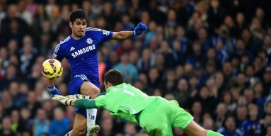Diego Costa of Chelsea is challenged by Ben Foster of West Brom during the Barclays Premier League match between Chelsea and West Bromwich Albion at Stamford Bridge on November 22, 2014 in London, England. 