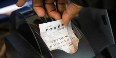 A Powerball lottery ticket is printed for a customer at a 7-Eleven store on February 11, 2015 in Chicago, Illinois.