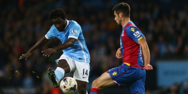 Wilfried Bony of Manchester City shoots as Scott Dann of Crystal Palace challenges during the Capital One Cup fourth round match at the Etihad Stadium on October 28, 2015 in Manchester, England. 