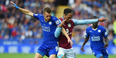 Jamie Vardy of Leicester City and Joleon Lescott of Aston Villa battle for the ball during the Barclays Premier League match between Leicester City and Aston Villa at the King Power Stadium on September 13, 2015 in Leicester, United Kingdom.