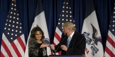 Republican presidential candidate Donald Trump shakes hands with former Alaska Gov. Sarah Palin at Hansen Agriculture Student Learning Center at Iowa State University on January 19, 2016 in Ames, IA. 