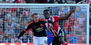 Wayne Rooney of Manchester United holds off a tackle from Victor Wanyama of Southampton during the Barclays Premier League match between Southampton and Manchester United at St Mary's Stadium on September 20, 2015 in Southampton, United Kingdom. 
