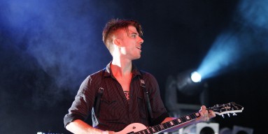 Ben Curtis performs with School of Seven Bells during 2011. 