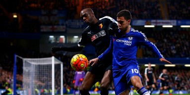 Allan-Romeo Nyom of Watford battles for the ball with Eden Hazard of Chelsea during the Barclays Premier League match between Chelsea and Watford at Stamford Bridge on December 26, 2015 in London, England. 