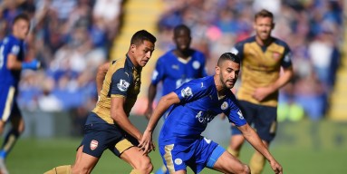 Riyad Mahrez of Leicester City and Alexis Sanchez of Arsenal compete for the ball during the Barclays Premier League match between Leicester City and Arsenal at The King Power Stadium on September 26, 2015 in Leicester, United Kingdom. 