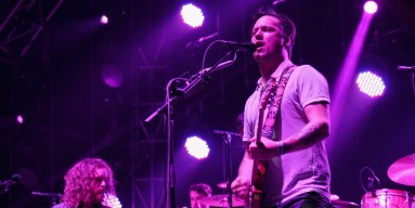 Russell Higbee (L) and Isaac Brock (C) of Modest Mouse perform onstage during day 2 of the Firefly Music Festival on June 19, 2015 in Dover, Delaware