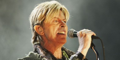 David Bowie performs on stage on the third and final day of 'The Nokia Isle of Wight Festival 2004' at Seaclose Park