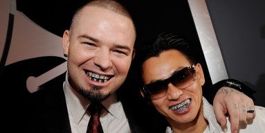 Paul Wall (L) and jeweler Johnny Dang arrive at the 52nd Annual GRAMMY Awards 