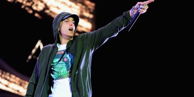 Eminem gives Chicago the finger at Lollapalooza. 