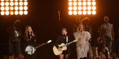 Beyonce (R) performs onstage with Emily Robison and Natalie Maines of Dixie Chicks at the 50th annual CMA Awards
