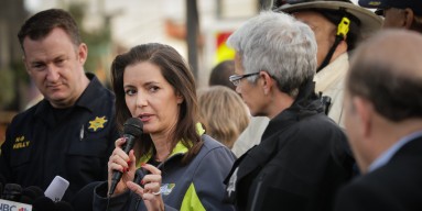 Oakland Mayor Libby Schaaf (C) speaks at a media event following a warehouse fire that has claimed the lives of at least thirty-three people on December 4, 2016 in Oakland, California