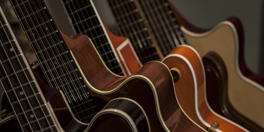 Shallow Focus Photography of Brown Guitars