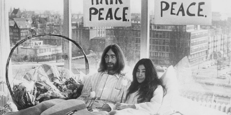 John Lennon and Yoko Ono lay in their bed in the Presidential Suite of the Hilton Hotel, Amsterdam, 25th March 1969. The couple are staging a 'bed-in for peace' and intend to stay in bed for seven days 'as a protest against war and violence in the world.'