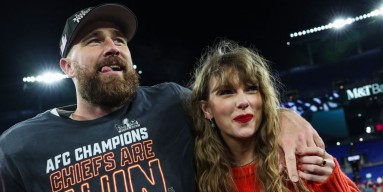 Travis Kelce of the Kansas City Chiefs celebrates with Taylor Swift after defeating the Baltimore Ravens in the AFC Championship Game at M&T Bank Stadium on January 28 in Baltimore, Maryland. 