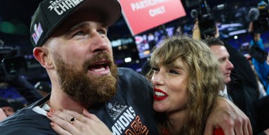 Travis Kelce of the Kansas City Chiefs celebrates with Taylor Swift after defeating the Baltimore Ravens in the AFC Championship Game at M&T Bank Stadium on January 28, 2024 in Baltimore, Maryland. 
