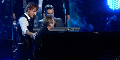 Ed Sheeran (L) and Richard Tandy perform "Mr. Blue Sky" onstage during The 57th Annual GRAMMY Awards at the at the STAPLES Center on February 8, 2015 in Los Angeles