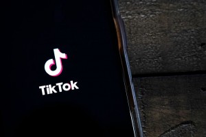 TikTok logo displayed on an iPhone